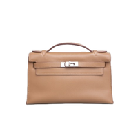 HERMES KELLY POCHETTE SESAME SWIFT (2010)