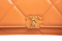 CHANEL WOC SMALL LAMBSKIN QUILTED ORANGE-TWO TONE HDWR