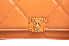 CHANEL WOC SMALL LAMBSKIN QUILTED ORANGE-TWO TONE HDWR