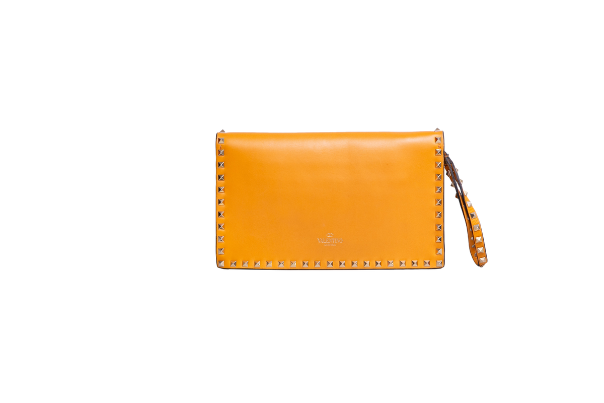 VALENTINO ROCKSTUD WRISTLET CLUTCH MUSTARD