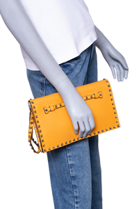 VALENTINO ROCKSTUD WRISTLET CLUTCH MUSTARD