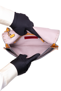 VALENTINO ROCKSTUD WRISTLET CLUTCH MUSTARD