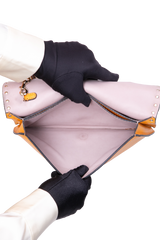 VALENTINO ROCKSTUD WRISTLET CLUTCH MUSTARD