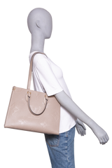 LV ON THE GO MM MONOGRAM EMPREINTE TAUPE