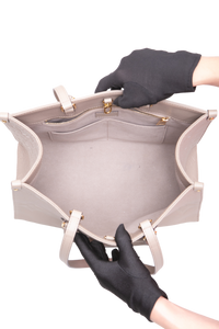 LV ON THE GO MM MONOGRAM EMPREINTE TAUPE
