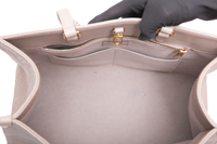 LV ON THE GO MM MONOGRAM EMPREINTE TAUPE