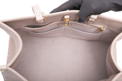 LV ON THE GO MM MONOGRAM EMPREINTE TAUPE