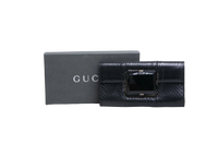 GUCCI CLUTCH PYTHON WITH LARGE FACETED STONE BLACK