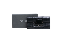 GUCCI CLUTCH PYTHON WITH LARGE FACETED STONE BLACK