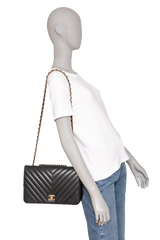 CHANEL STATEMENT FLAP SMALL CHEVRON LAMBSKIN BLACK