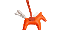 HERMÈS RODEO PM MILO LAMBSKIN ORANGE POPPY/CRAIE/TERRE BATTUE