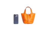 HERMÈS PICOTIN LOCK 18 TAURILLON CLEMENCE ORANGE SILVER HDWR