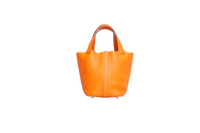 HERMÈS PICOTIN LOCK 18 TAURILLON CLEMENCE ORANGE SILVER HDWR
