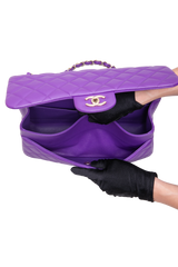 CHANEL CLASSIC DOUBLE FLAP/JUMBO CAVIAR PURPLE